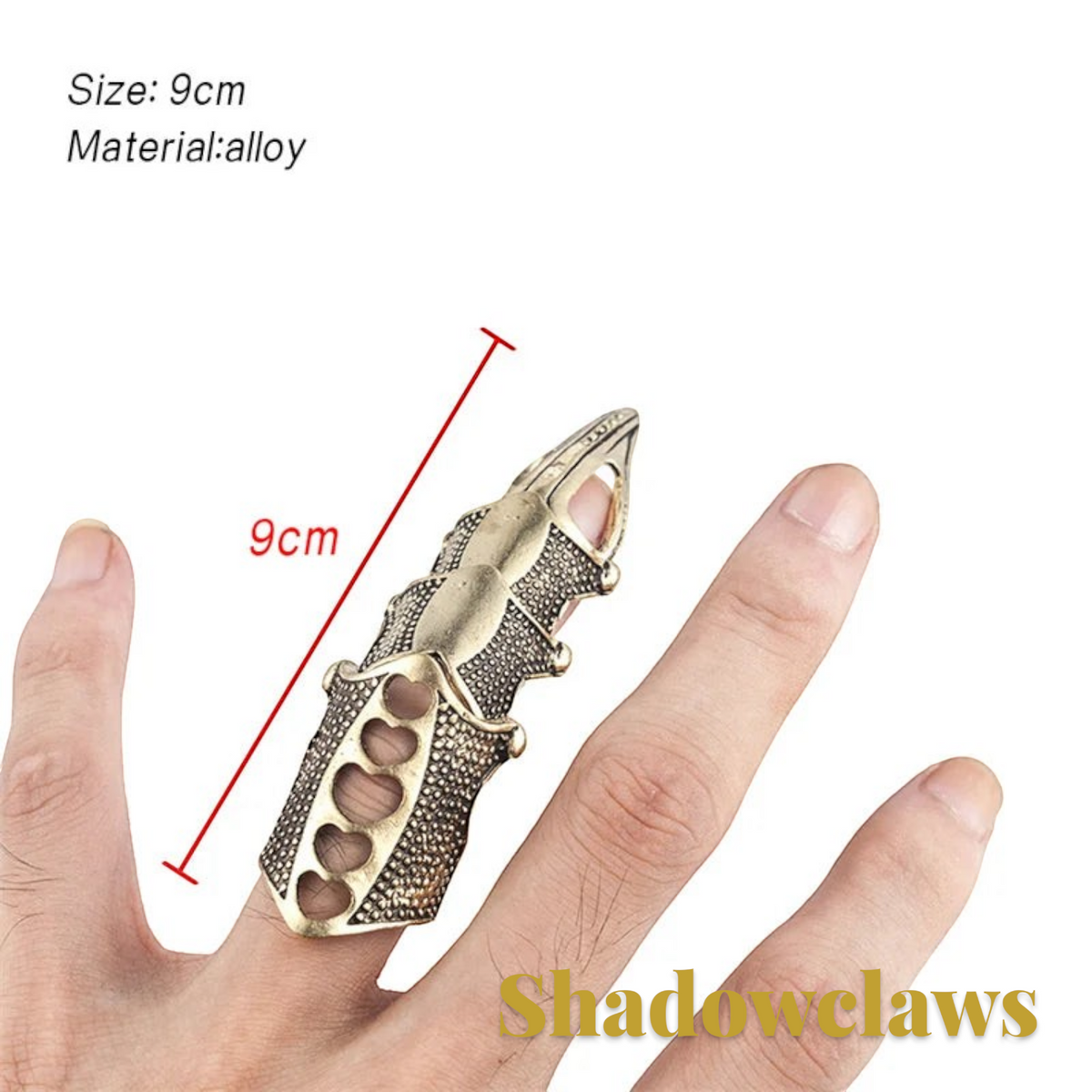 Gr8est steampunk claw ring in antique brass finish worn on a finger, featuring a textured articulated metal design.
