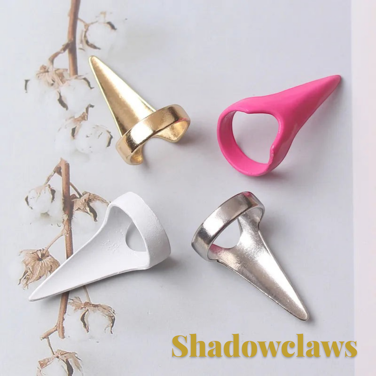 Gr8est set of four Shadowclaws steampunk claw rings in gold, pink, white, and silver zinc alloy finishes.