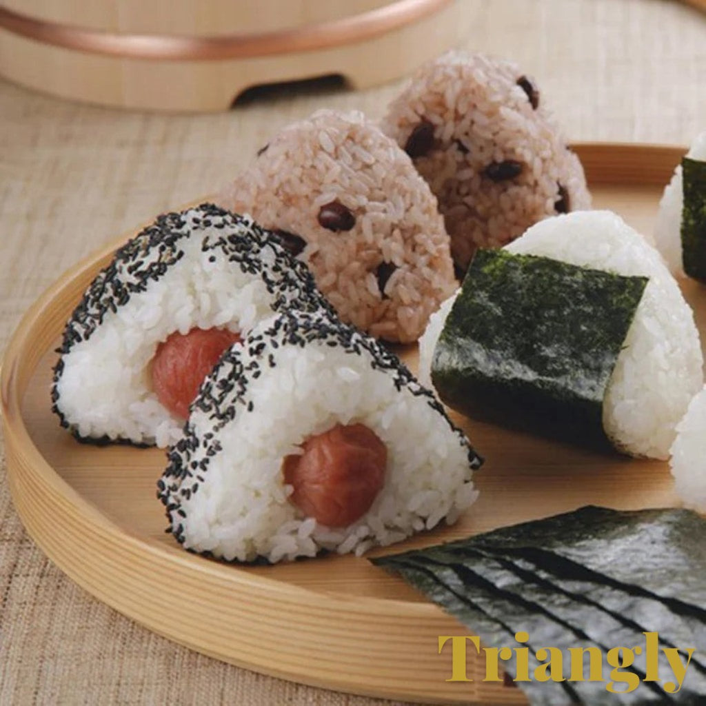 Gr8est triangle sushi and onigiri rice balls with sesame seeds and nori on a wooden tray