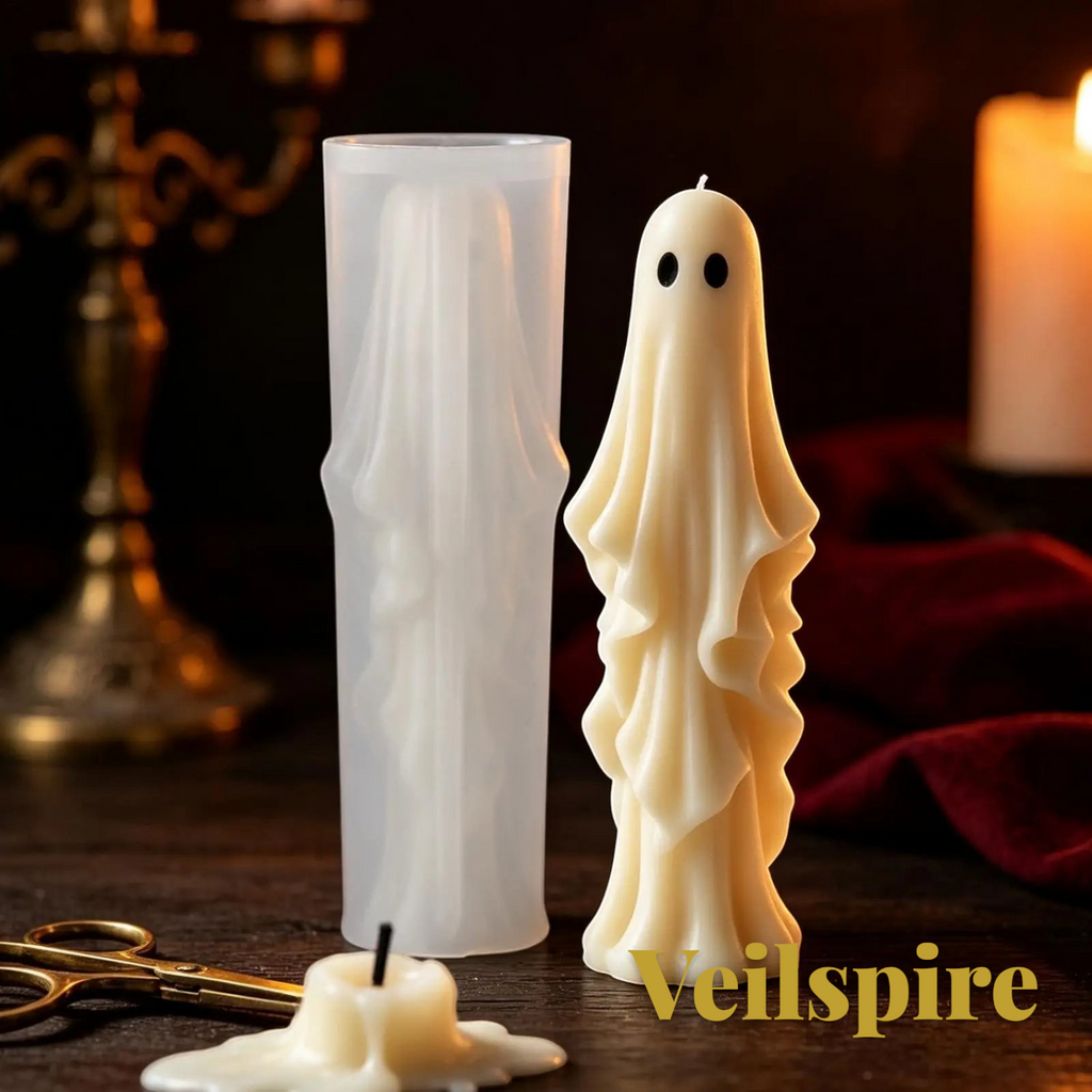 Gr8est Veilspire 3D silicone ghost candle mold next to a finished white draped ghost candle on a dark table.