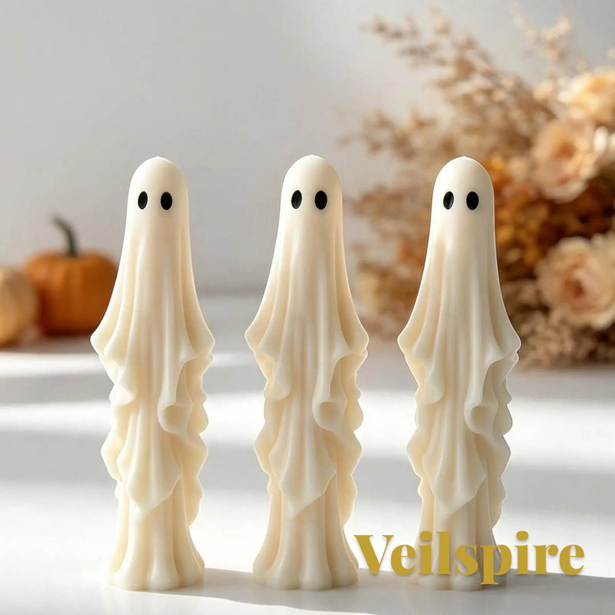 Gr8est Veilspire 3D ghost candles with draped fabric texture standing on a white surface for Halloween decor