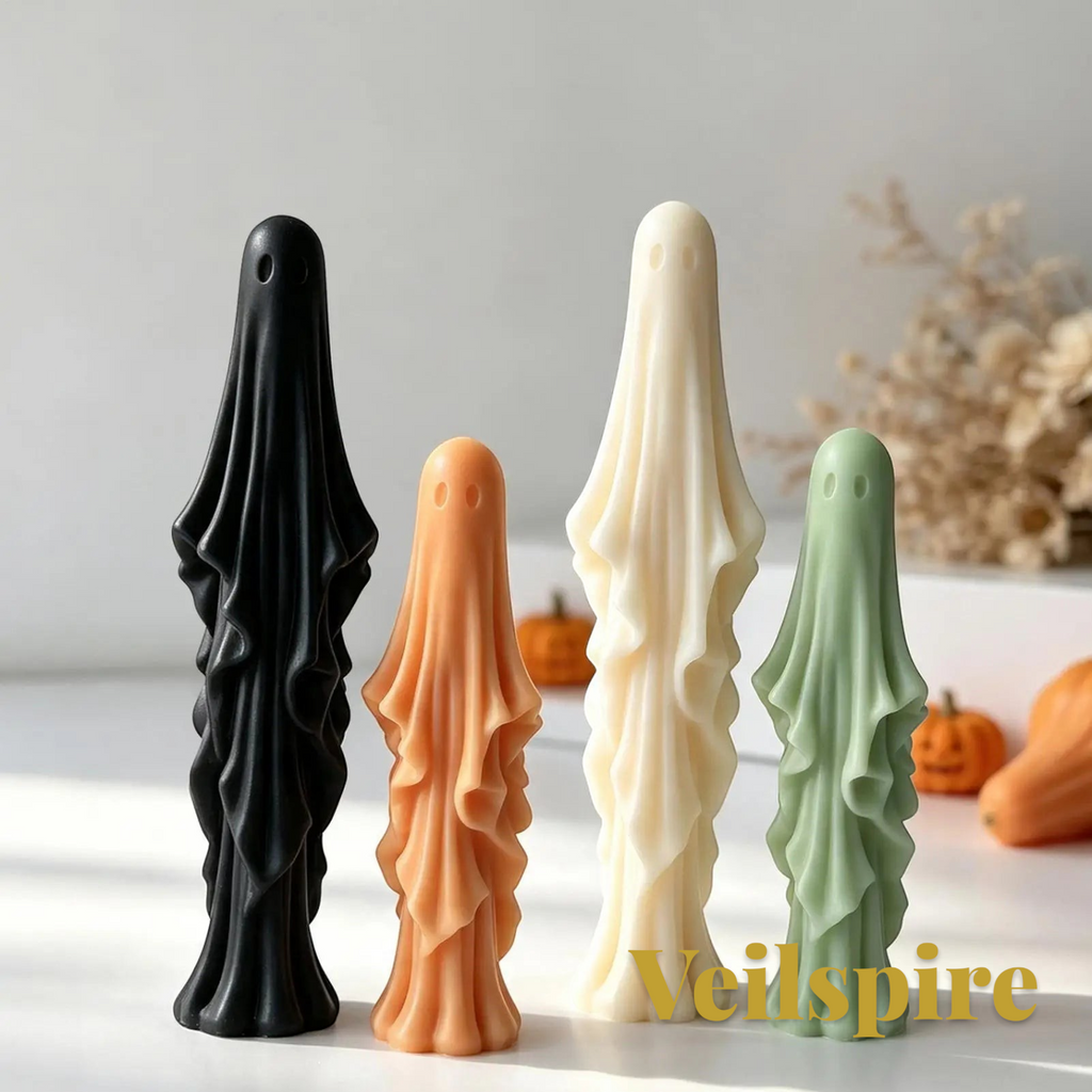 Gr8est Veilspire 3D ghost candle molds in black, orange, white, and green standing on a table for Halloween decor.