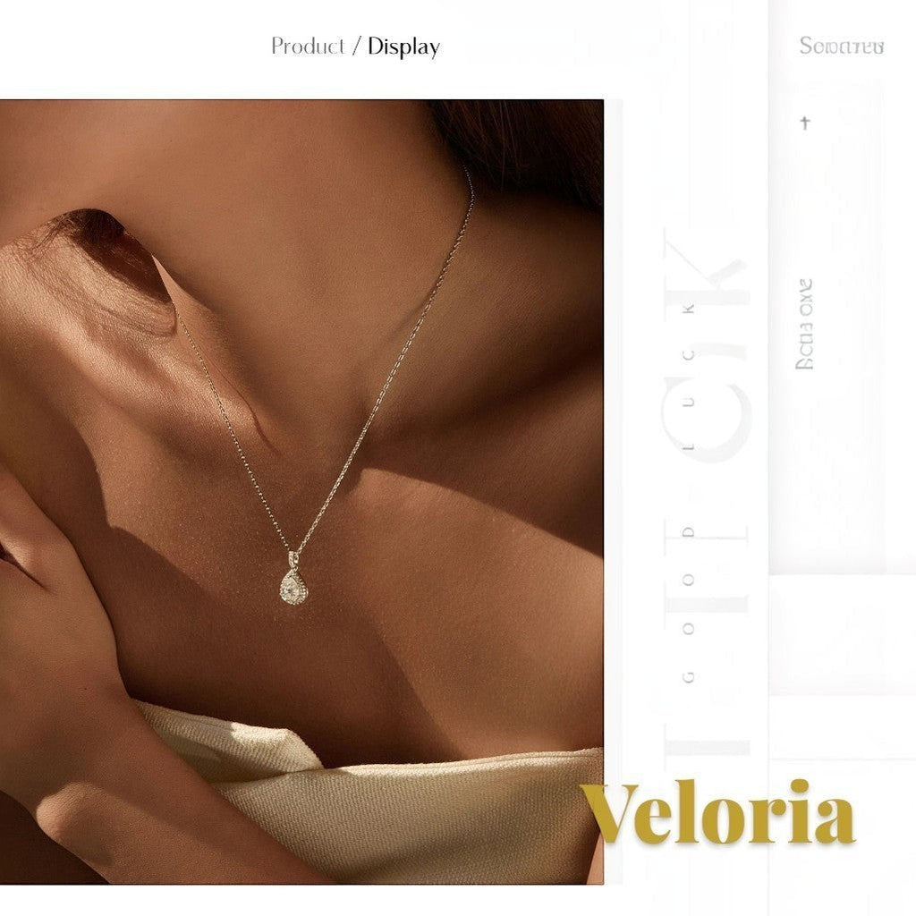 Gr8est Veloria 1.2CT water drop moissanite pendant necklace in 925 sterling silver worn on a woman's neck