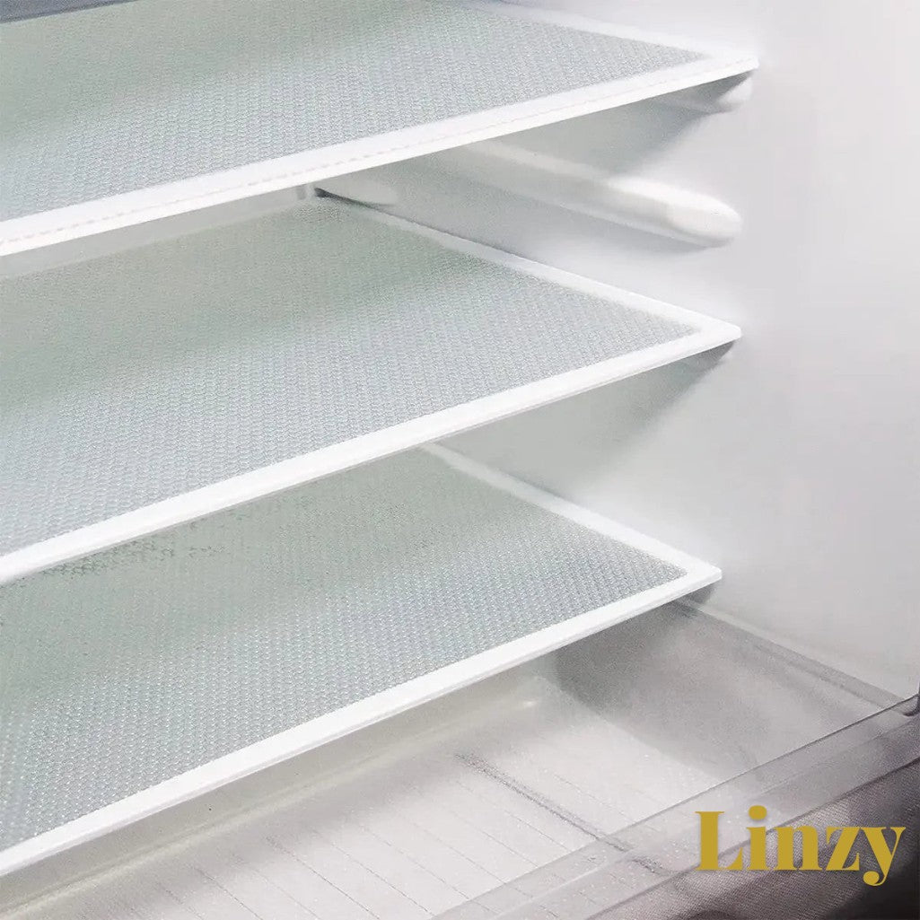 Gr8est waterproof EVA fridge liner mats with a textured surface installed on refrigerator shelves for easy cleaning.