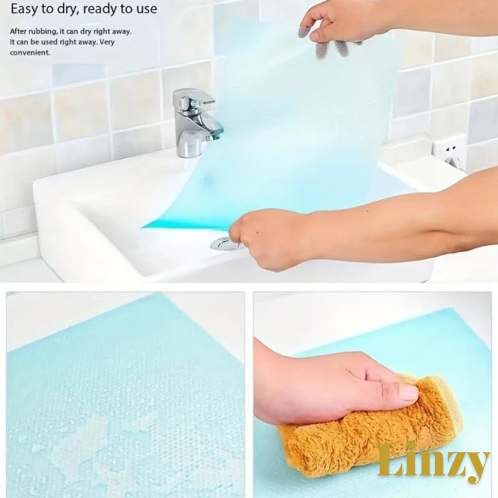 Gr8est waterproof EVA fridge and cabinet liner mat being cleaned with a cloth in a kitchen sink