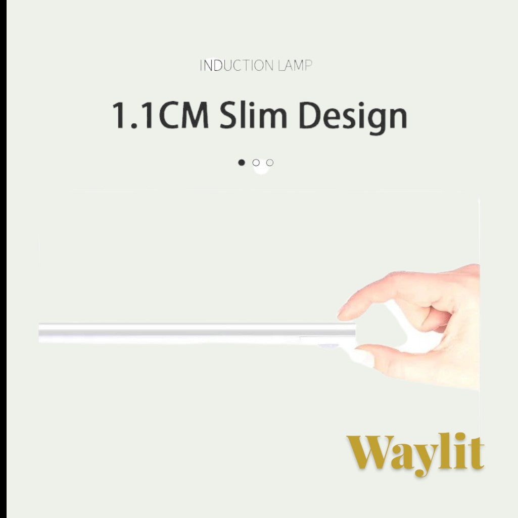 Gr8est Waylit slim motion sensor LED bar light being held by a hand to demonstrate its 1.1cm thin profile