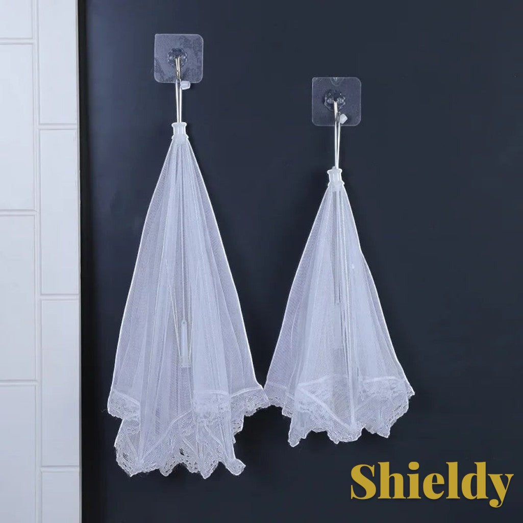 Gr8est white mesh food covers hanging on wall hooks for compact storage